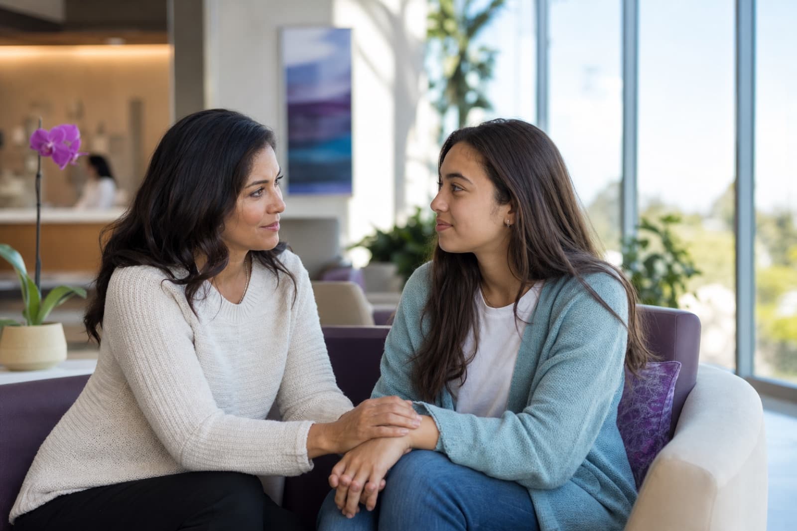 A parent and child in a warm, supportive healthcare moment