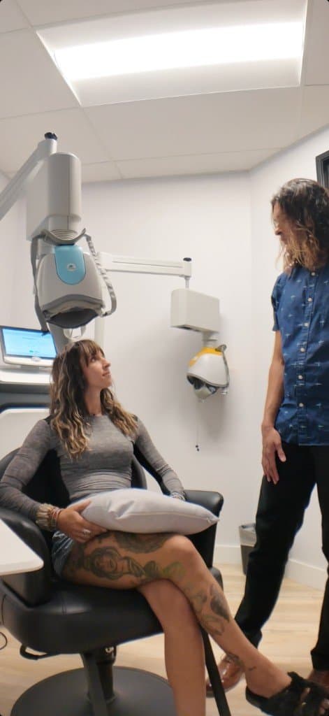 Patient receiving FDA-cleared Deep TMS at Brain Centers San Diego